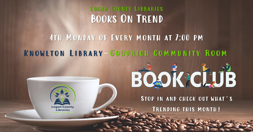 Coffee cup with coffee beans beside it