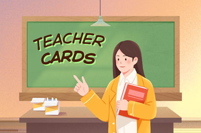Teacher in front of green chalkboard
